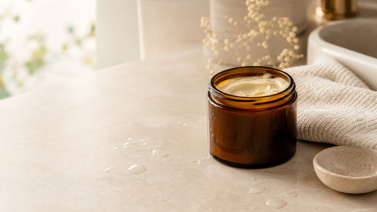 Tallow balm jar on bathroom vanity for a simple face moisturising routine