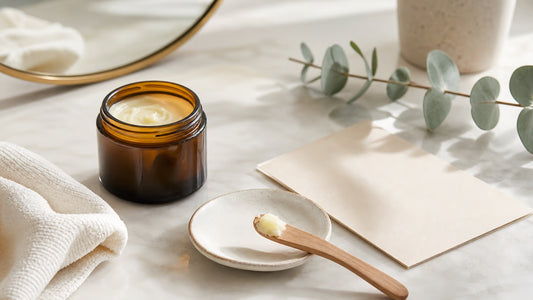 Open tallow balm jar with spatula, dish and face cloth for a simple patch test routine