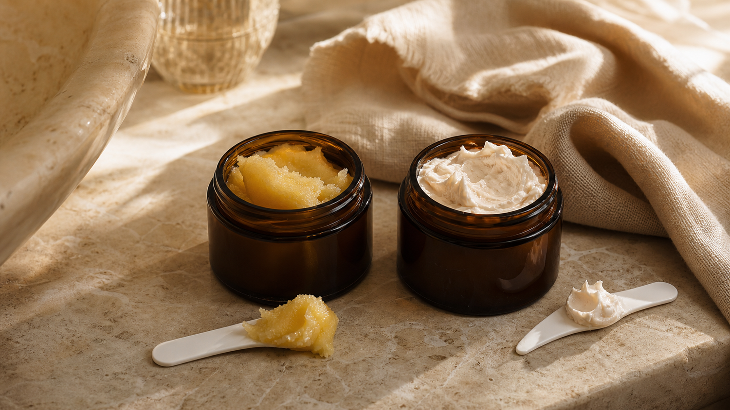 Tallow cream and tallow balm textures compared in amber skincare jars